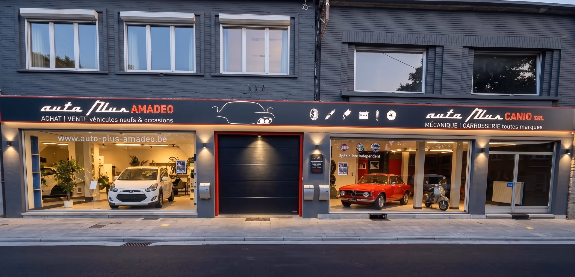 Devanture du garage Auto Plus Canio de nuit a Liege